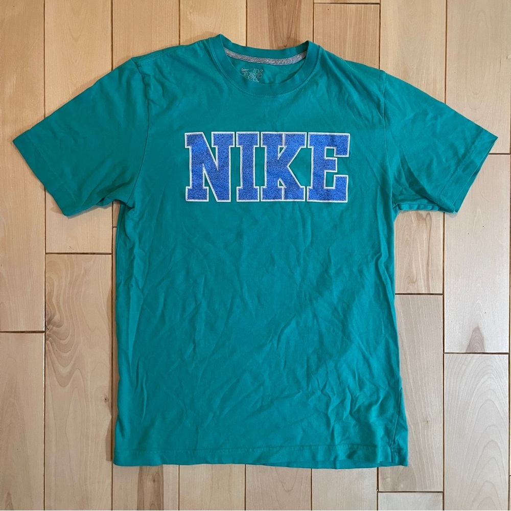 Nike The Athletic Dept turquoise t-shirt with blue logo size M
